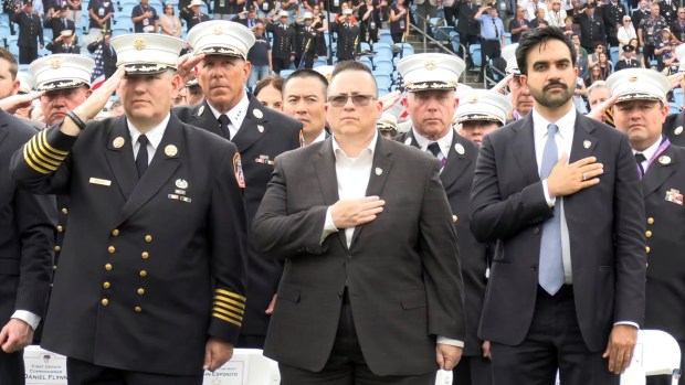 From left, FDNY Chief of Department John Esposito, FDNY Commissioner Lillian Bonsignore and Mayor Zohran Mamdani are pictured during the FDNY's memorial service to commemorate the 25th anniversary of 9/11 attacks and honor the 343 FDNY members who died that day, as well as the FDNY members, active and retired who have since died from World Trade Center-related illnesses at Staten Island University Hospital Community Park stadium on Staten Island on Wednesday, Sept. 9, 2026. (FDNY)