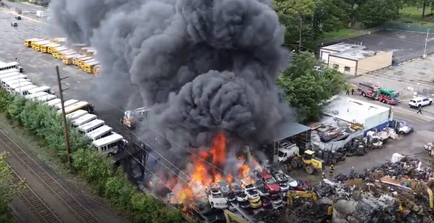 News 12 | Bronx | Firefighters Battle Massive Flames At Bay Shore Scrapyard
