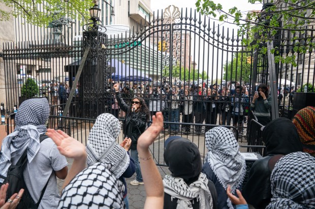 Pro-Palestinian protestors demonstrate at the Amsterdam Ave. and W. 116th St. entrance to Columbia University on Tuesday, April 30, 2024, in Manhattan, New York. (Barry Williams for New York Daily News)