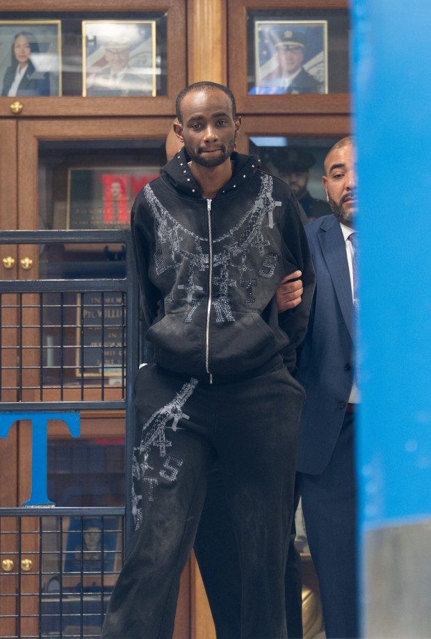 Deandre Creary is pictured in police custody leaving the NYPD's 77th Precinct stationhouse in Brooklyn on Tuesday, Sept. 8, 2026. (Barry Williams/ New York Daily News)