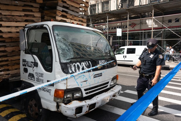 Police investigate after multiple pedestrians were struck by a truck on Canal St. and the Bowery in Manhattan on Thursday, Sept. 10, 2026. (Gardiner Anderson / New York Daily News)