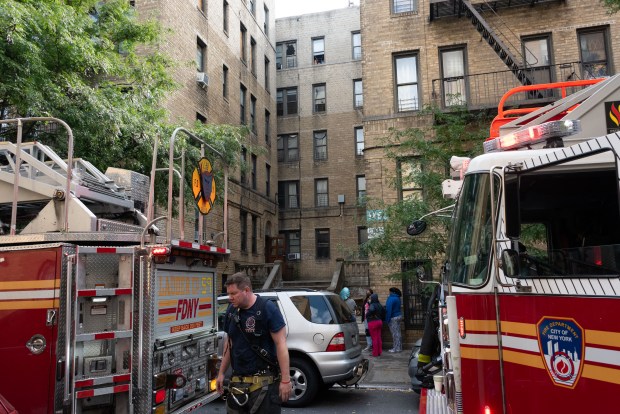 Firefighters respond to a fatal fire at 1484 Montgomery Ave. in the Bronx on Wednesday, Sept. 23, 2026. (Gardiner Anderson / New York Daily News)
