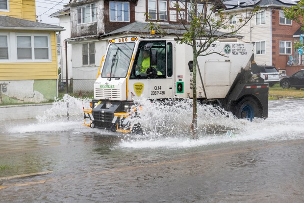 (Flood waters on Beach 69th Street) A powerful Nor'easter brought heavy, wind driven downpours to New York City, causing widespread flooding and bringing down trees on Saturday September 26, 2026. 0739. (Theodore Parisienne / New York Daily News)