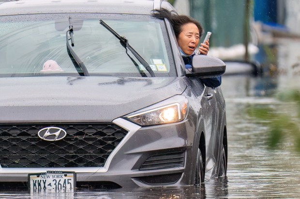 Visiting nurse practitioner Suki Kang is seen here in her stalled-out Hyundai SUV on Beach 71st St. on Saturday, September 26, 2026. (Theodore Parisienne / New York Daily News)