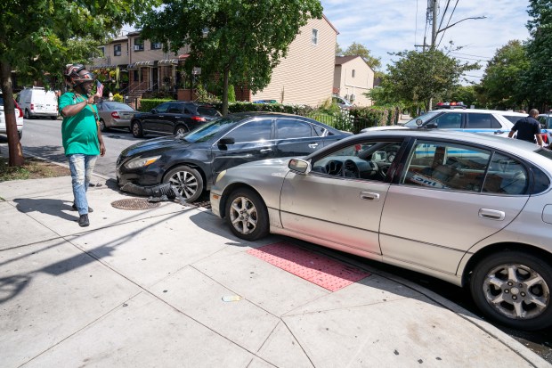 According to witnesses, a man driving a black Nissan Altima sedan with a female passenger in tow was being pursued by another man driving an older model beige Lexus sedan eastbound on New Lots Avenue in Brooklyn on Thursday September 3, 2026. 1153. The man driving the Altima allegedly stabbed the pursuer multiple times at an unknown location. As the Altima tried to turn right onto Elton Street, the pursuing Lexus struck the rear of the Altima, causing it to mount the sidewalk where it made contact with a small tree. As the Altima backed off and tried to leave, the Lexus partially mounted the sidewalk and struck the driver door of the Altima. All occupants of both vehicles then exited and engaged in a physical fight, with the woman from the Altima at one point pulling a gun from a bag as her accomplice yelled 'Give me the Gun'. No shots were fired. The driver of the Altima then took off running westbound on New lots Avenue, with the bleeding driver of the Lexus in hot pursuit. The Lexus driver caught up with his adversary just past 866 New Lots Avenue and, while gushing blood from his wounds, managed to get the upper hand and gouged out the left eye of his adversary while screaming 'You tried to kill me', before dropping it on the sidewalk. The Lexus driver then collapsed between parked cars a few feet away. According to witnesses, the woman from the black Nissan Altima was eventually arrested, but only after she got rid of the gun, removed other items from the car, and changed her clothes. (Theodore Parisienne / New York Daily News)