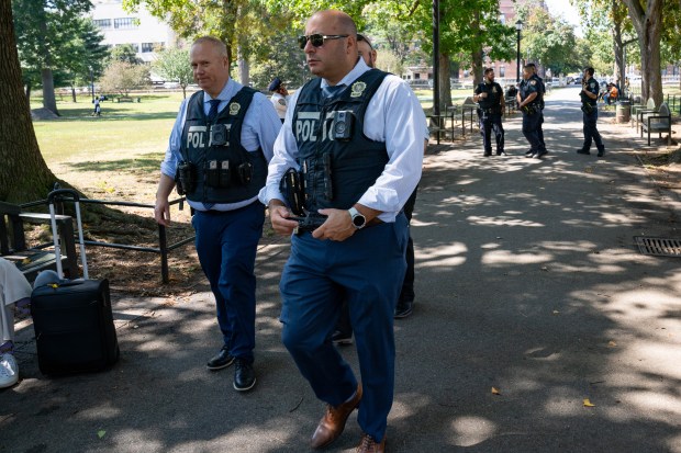 NYPD Officers responding to a call of a man shot at Jamaica Avenue and 150th Street found a 14yr old boy suffering from a gunshot wound to his left thigh inside of the Rufus King Park in Queens on Friday Sept. 5, 2025. 1143. The boy, who is being characterized by the NYPD as being 'very uncooperative', was taken to Northwell Cohen's Children Medical Center. (Theodore Parisienne / New York Daily News)