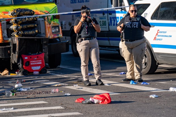(A blood soaked Trinidad and Tobago Flag is seen here) A 36yr old man was rushed to Kings County Hospital in critical condition after he was stabbed in the face and neck on Utica Avenue, in a scene that stretched from Crown Street to President Street, in Brooklyn on Monday September 7, 2026. 0756. A 23yr old man and a 32yr old man, both stabbed at the same location, were also taken to Kings County Hospital. (Theodore Parisienne / New York Daily News)