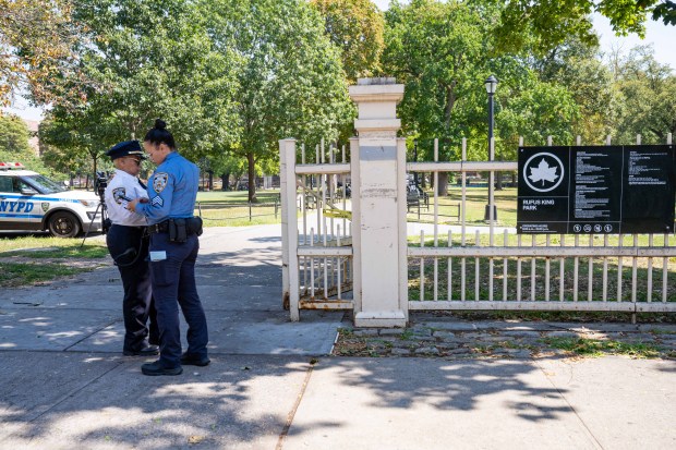 NYPD Officers responding to a call of a man shot at Jamaica Avenue and 150th Street found a 14yr old boy suffering from a gunshot wound to his left thigh inside of the Rufus King Park in Queens on Friday Sept. 5, 2025. 1143. The boy, who is being characterized by the NYPD as being 'very uncooperative', was taken to Northwell Cohen's Children Medical Center. (Theodore Parisienne / New York Daily News)