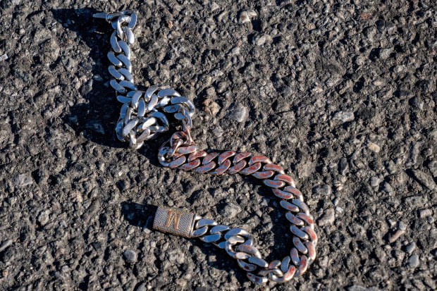 (A blood soaked chain is seen here) A 36yr old man was rushed to Kings County Hospital in critical condition after he was stabbed in the face and neck on Utica Avenue, in a scene that stretched from Crown Street to President Street, in Brooklyn on Monday September 7, 2026. 0756. A 23yr old man and a 32yr old man, both stabbed at the same location, were also taken to Kings County Hospital. (Theodore Parisienne / New York Daily News)
