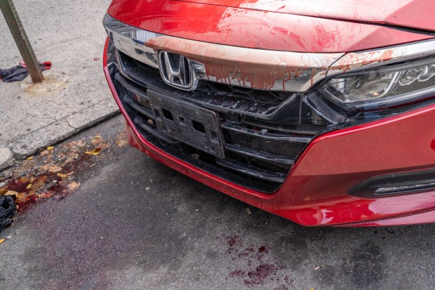 According to witnesses, a man driving a black Nissan Altima sedan with a female passenger in tow was being pursued by another man driving an older model beige Lexus sedan eastbound on New Lots Avenue in Brooklyn on Thursday September 3, 2026. 1153. The man driving the Altima allegedly stabbed the pursuer multiple times at an unknown location. As the Altima tried to turn right onto Elton Street, the pursuing Lexus struck the rear of the Altima, causing it to mount the sidewalk where it made contact with a small tree. As the Altima backed off and tried to leave, the Lexus partially mounted the sidewalk and struck the driver door of the Altima. All occupants of both vehicles then exited and engaged in a physical fight, with the woman from the Altima at one point pulling a gun from a bag as her accomplice yelled 'Give me the Gun'. No shots were fired. The driver of the Altima then took off running westbound on New lots Avenue, with the bleeding driver of the Lexus in hot pursuit. The Lexus driver caught up with his adversary just past 866 New Lots Avenue and, while gushing blood from his wounds, managed to get the upper hand and gouged out the left eye of his adversary while screaming 'You tried to kill me', before dropping it on the sidewalk. The Lexus driver then collapsed between parked cars a few feet away. According to witnesses, the woman from the black Nissan Altima was eventually arrested, but only after she got rid of the gun, removed other items from the car, and changed her clothes. (Theodore Parisienne / New York Daily News)