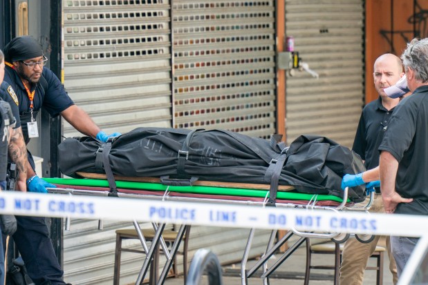 (The body of one victim is removed from the Lounge) A 27yr old man, a 35yr old man and an unknown adult male were pronounced deceased after they were all shot multiple times throughout the body whilst inside the Taste of The City Lounge at 903 Franklin Avenue in Brooklyn on Sunday Aug. 17, 2025. 0811. At least five additional men and three women were also shot inside the Lounge. (Theodore Parisienne / New York Daily News)