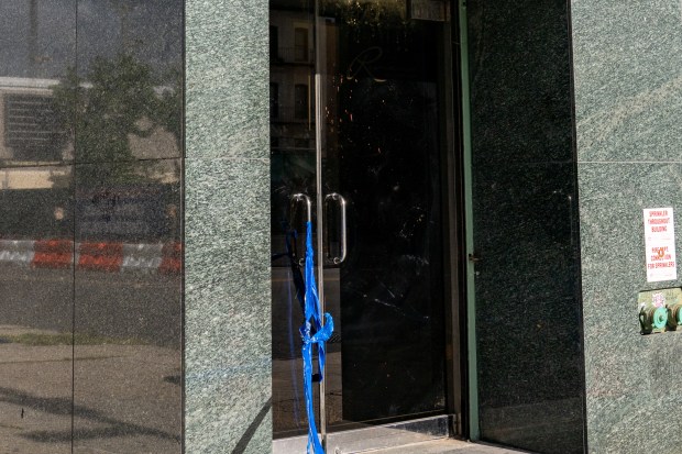 Blood is pictured splattered on a glass door after a 45-year-old man was fatally shot at Riviera Gentleman's Club on Steinway St. near 34th Ave. in Astoria, Queens, on Thursday, Sept. 24, 2026. (Theodore Parisienne / New York Daily News)