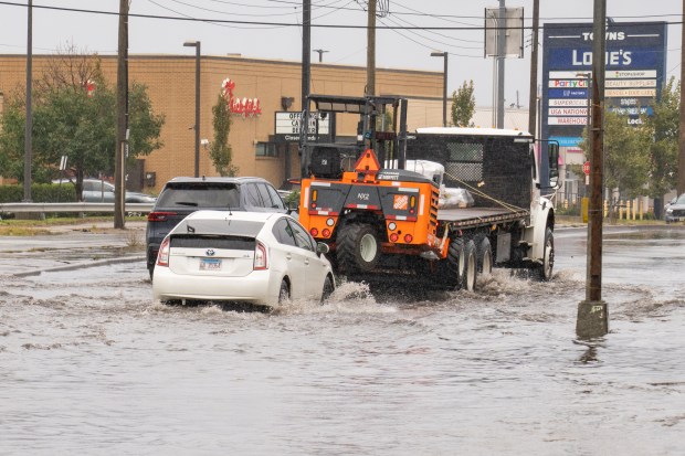 (Rockaway Turnpike is seen here flooded in the vicinity of 3rd Street) A powerful Nor'easter brought heavy, wind driven downpours to New York City, causing widespread flooding and bringing down trees on Saturday September 26, 2026. 0739. (Theodore Parisienne / New York Daily News)