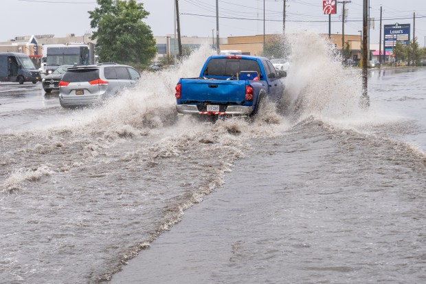 (Rockaway Turnpike is seen here flooded in the vicinity of 3rd Street) A powerful Nor'easter brought heavy, wind driven downpours to New York City, causing widespread flooding and bringing down trees on Saturday September 26, 2026. 0739. (Theodore Parisienne / New York Daily News)