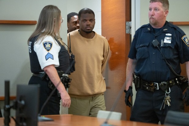 Isaiah Thompson, left, is pictured in Bronx Criminal Court during his sentencing for attacking an MTA subway conductor on Tuesday, September 22, 2026. (Barry Williams / New York Daily News)