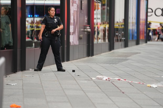 A woman was shot by NYPD cops after refusing to drop two knives she was swinging as she approached them in Times Square Monday, Aug. 31, 2026, at Seventh Ave. and W. 43rd St. in Midtown Manhattan. (Barry Williams / New York Daily News)