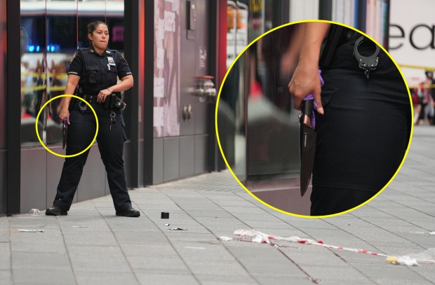 A woman was shot by NYPD cops after refusing to drop two knives she was swinging as she approached them in Times Square Monday, Aug. 31, 2026, at Seventh Ave. and W. 43rd St. in Midtown Manhattan. (Barry Williams / New York Daily News)