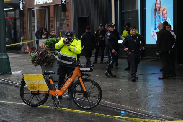 Police investigate after a bicyclist was killed in a collision with a dump truck on West 34th St. in Manhattan on Monday, Sep. 28, 2026.