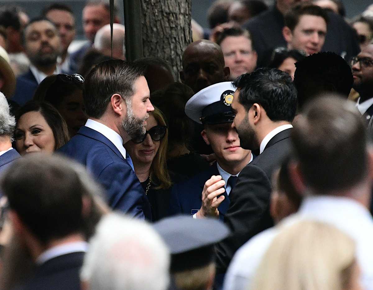 Vice President J.D. Vance and Mayor Zohran Mamdani greet each other at the 9/11 Memorial on Sept. 11, 2026. 