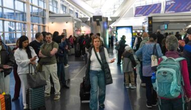 People wait in long TSA security lines at John F. Kennedy International Airport (JFK) in the Queens borough of New York, Monday, March 23, 2026.
