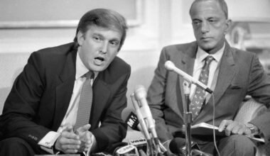 Donald Trump with Roy Cohn, then his lawyer, at a news conference where they announced a billion-dollar lawsuit against the National Football League in New York in October 1984.