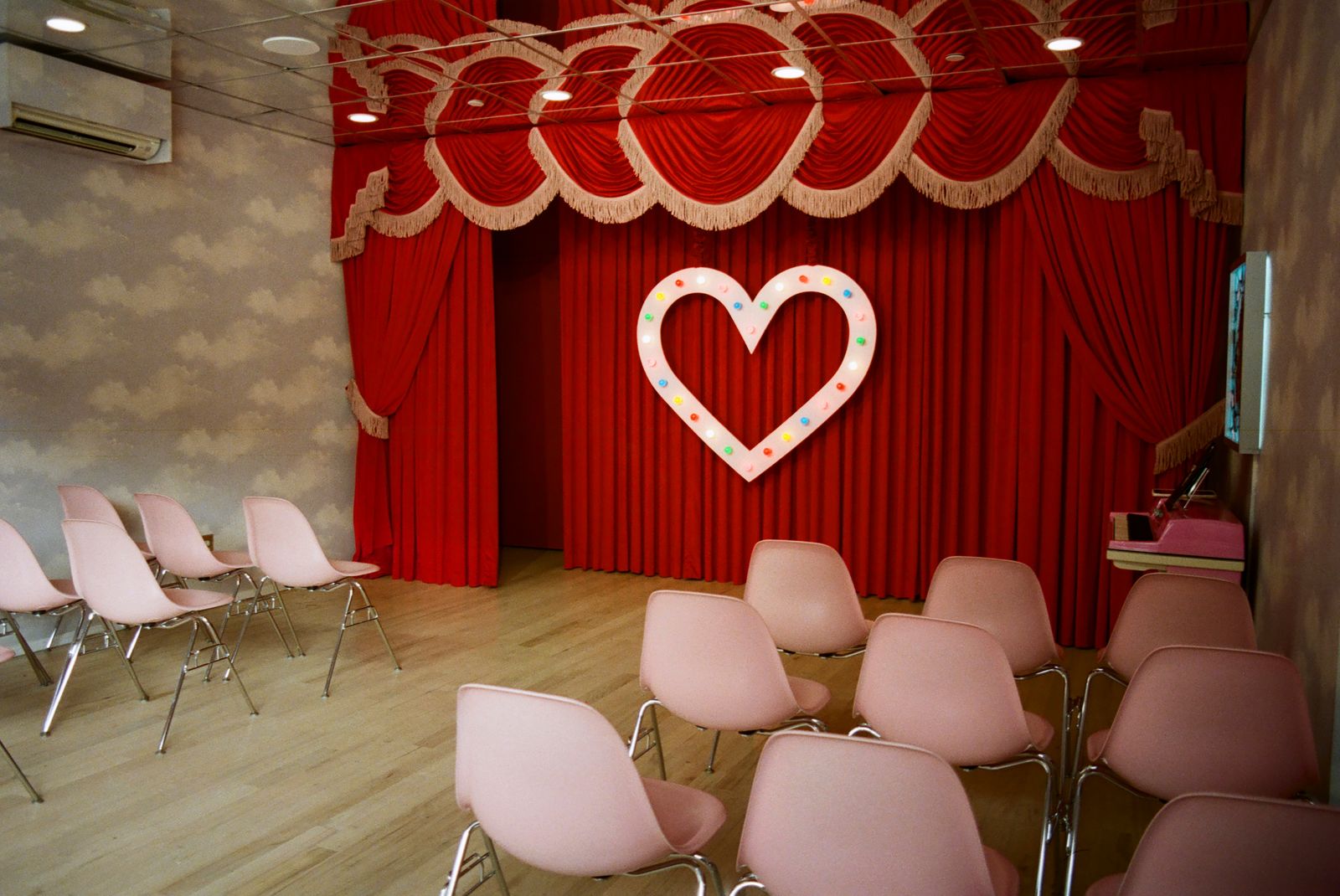 Image may contain Indoors Interior Design Chair Furniture and Symbol