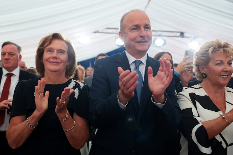 Taoiseach Micheál Martin and his wife Mary Martin applaud as they listen to Donald Trump's remarks. Photograph: Anna Moneymaker/Getty Images