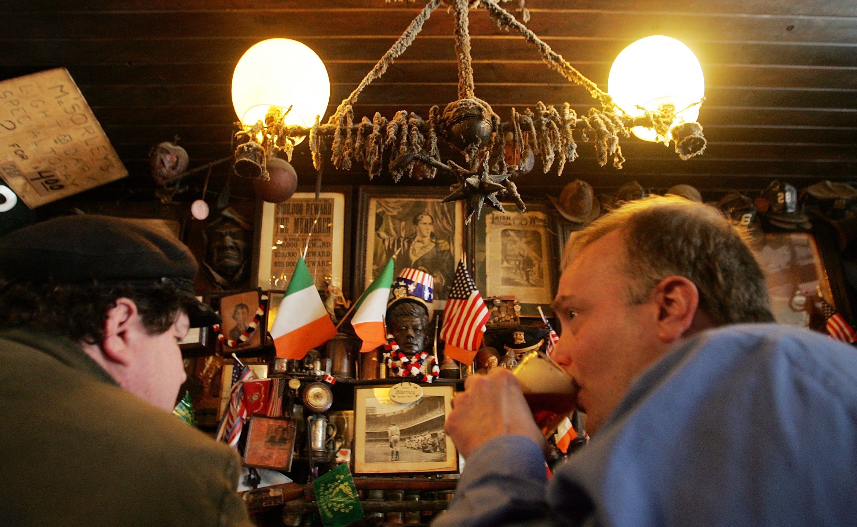 Patrons drinking inside McSorley's Old Ale House in New York City's East Village