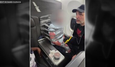 Passengers who helped restrain disruptive man on American Airlines flight describe chaos