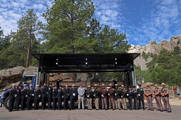 Stephen Siller has been touring the United State with a 17,000 pound, 21 foot steel beam from the North Tower to help educate the next generation about the tragedy. The beam is pictured here at Mt. Rushmore in South Dakota on July 28. (T2T Steel Across America)