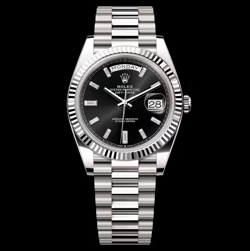 luxury wristwatch with black dial displaying day and date. luxury wristwatch with black dial displaying day and date.