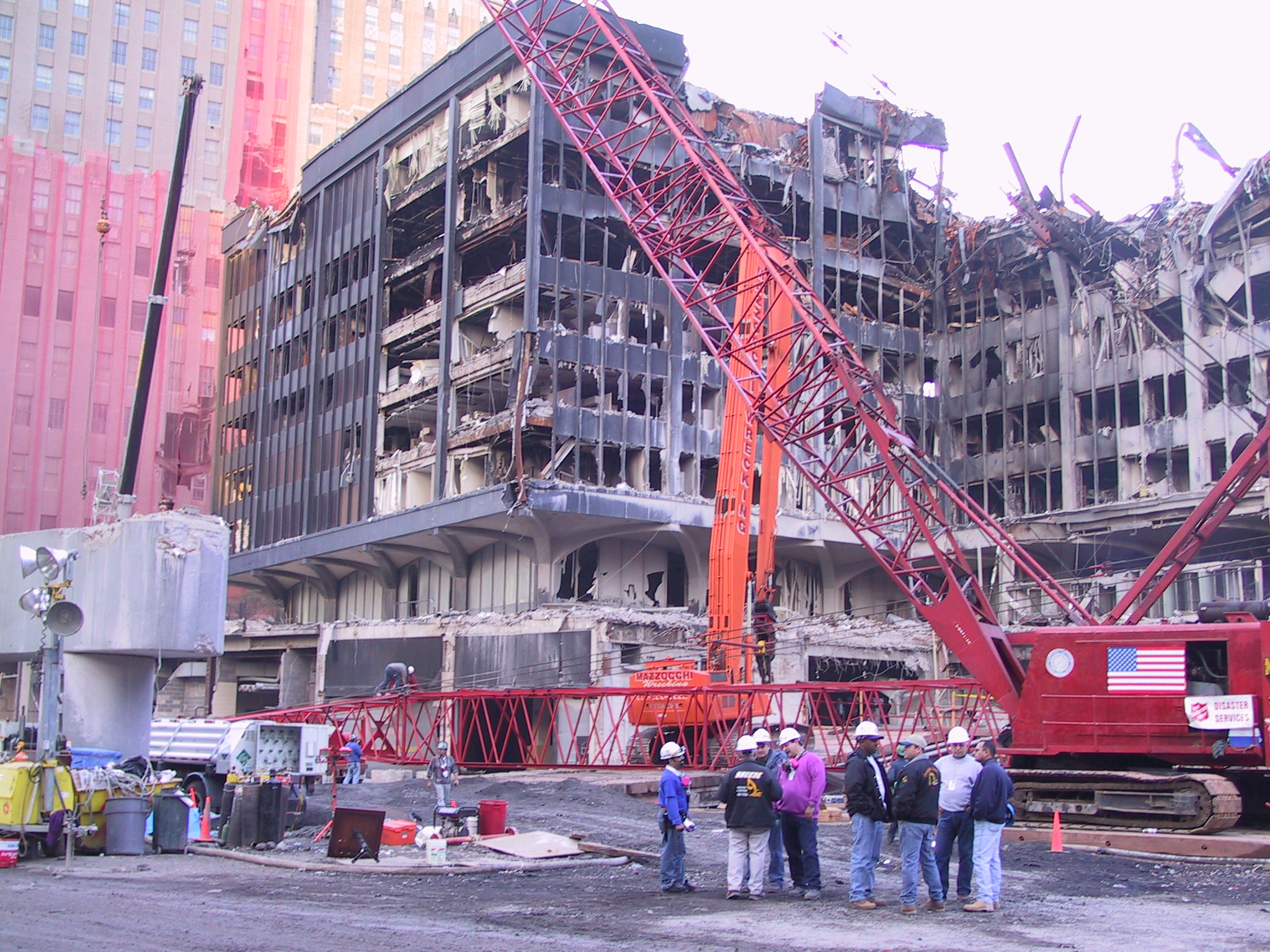 Vega (l.) during a pre-shift meeting at Ground Zero. 