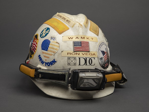 Vega's DDC helmet with decals and signatures from celebrity visitors at Ground Zero. 