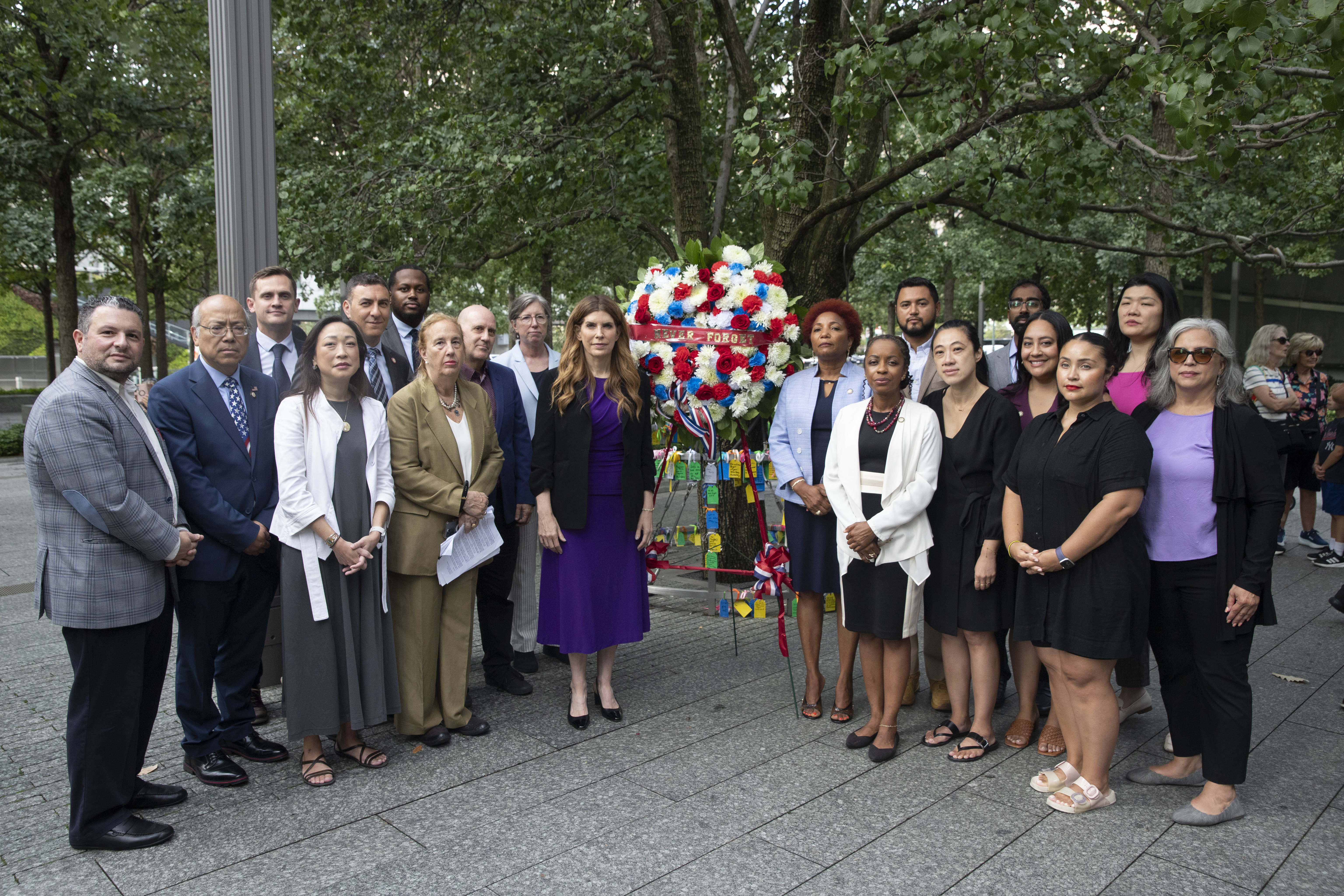 Members of the Queens delegation to the City Council joined Speaker Julie Menin in front of the Survivor Tree on Sept. 5 after announcing $1 million in funding for the 9/11 Museum. 