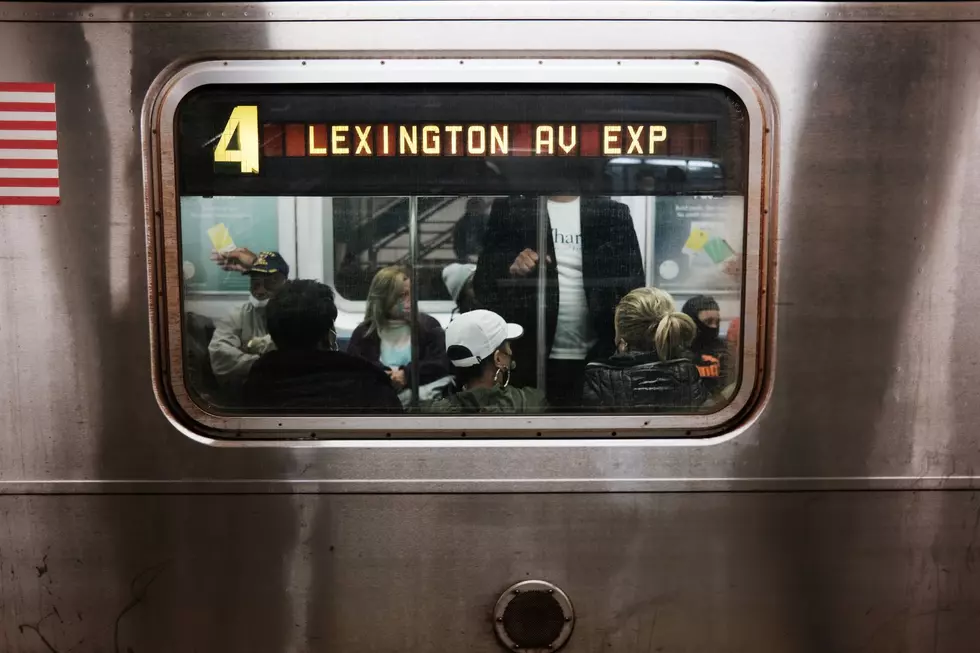 People ride the 4 train on April 25, 2022 in New York City