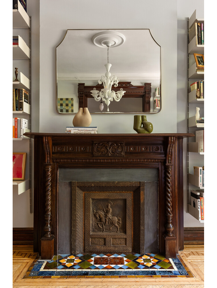 front parlor mantel with colorful tile hearth