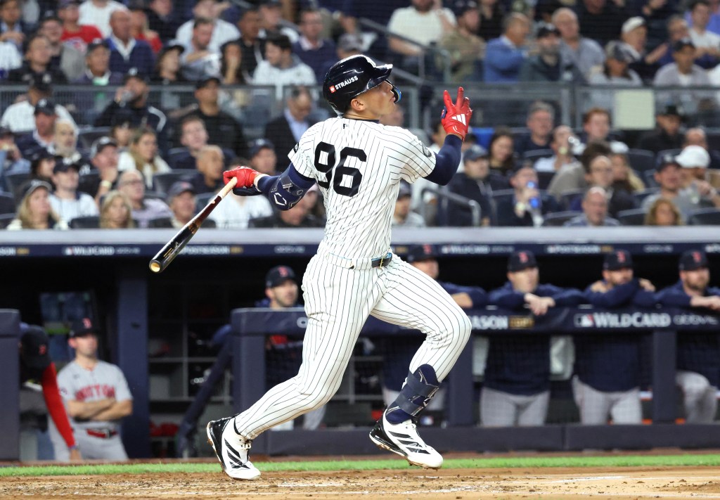 New York Yankees shortstop George Lombard Jr. hits a single in the second inning during Game 1 of the American League Wild Card Series against the Boston Red Sox at Yankee Stadium.