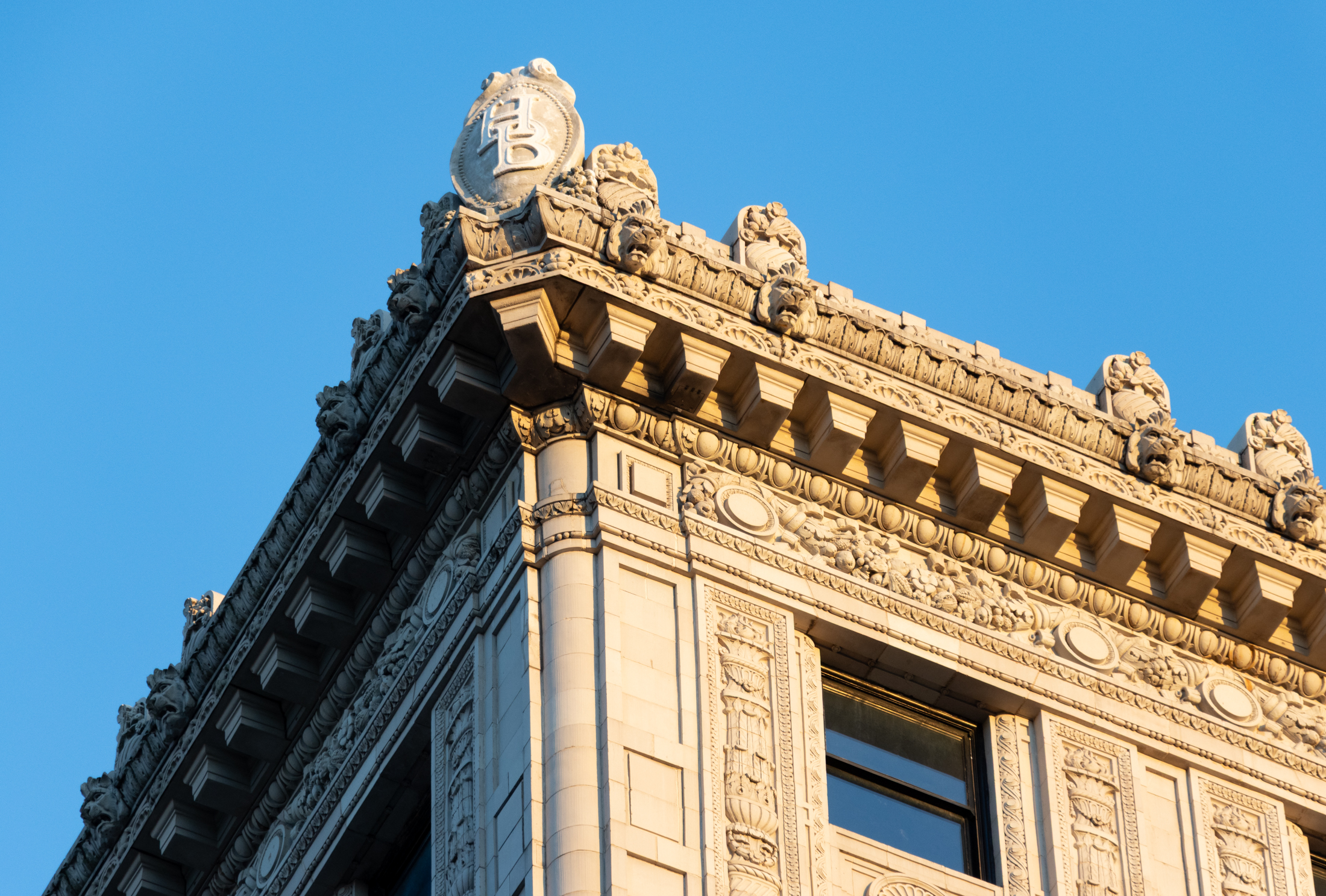 cornice of hotel bossert with lions and other ornamentation