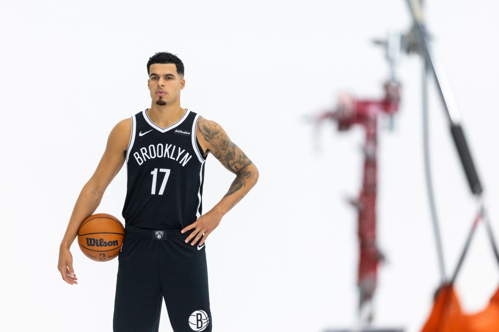 Brooklyn Nets' Michael Porter Jr. poses with a basketball during Media Day.