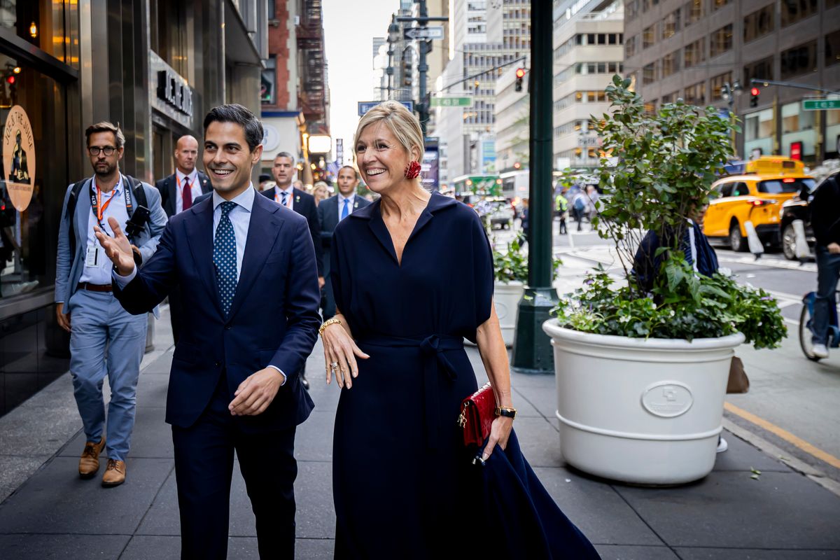 Queen Maxima of The Netherlands walks through the city with Dutch prime minister Rob Jetten