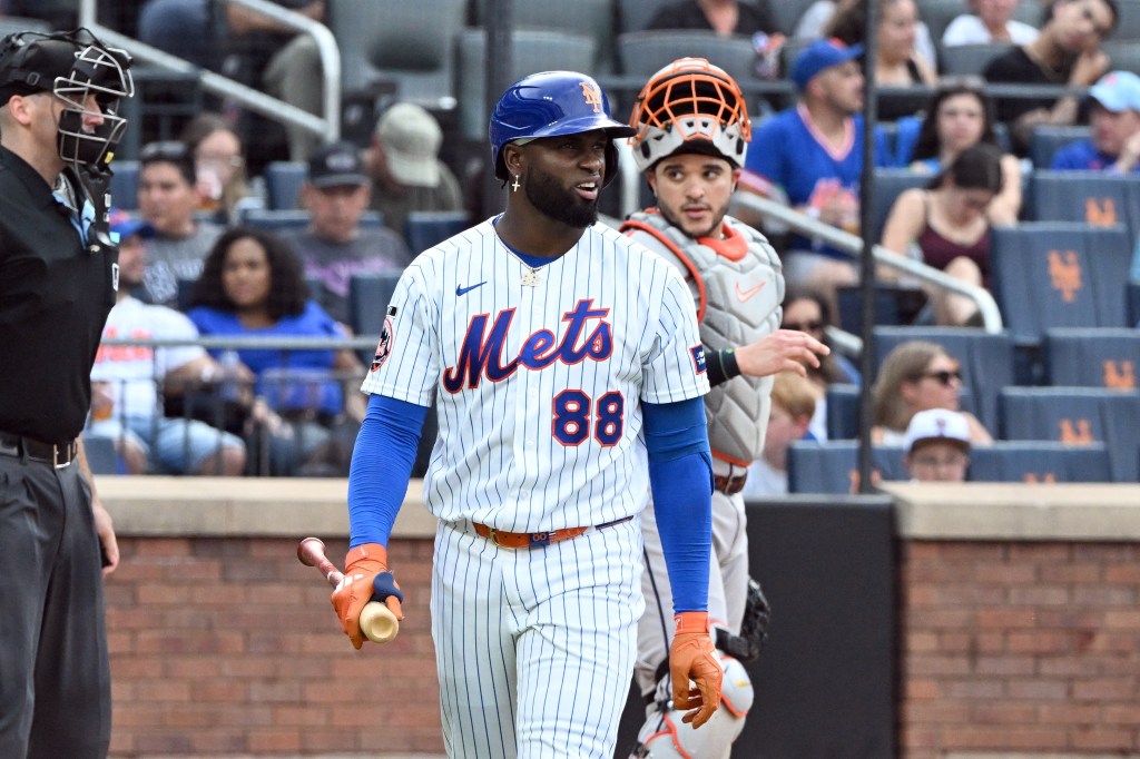 Mets' Luis Robert Jr. reacts after striking out against the Houston Astros.