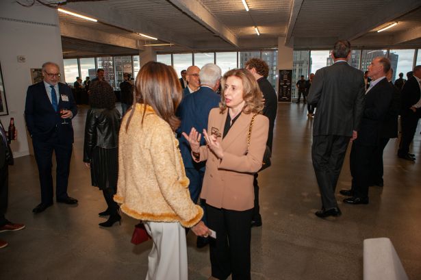 Attendees, including Mary Ann Tighe, mingle at the Commercial Observer Power Gala at 7 World Trade Center.
