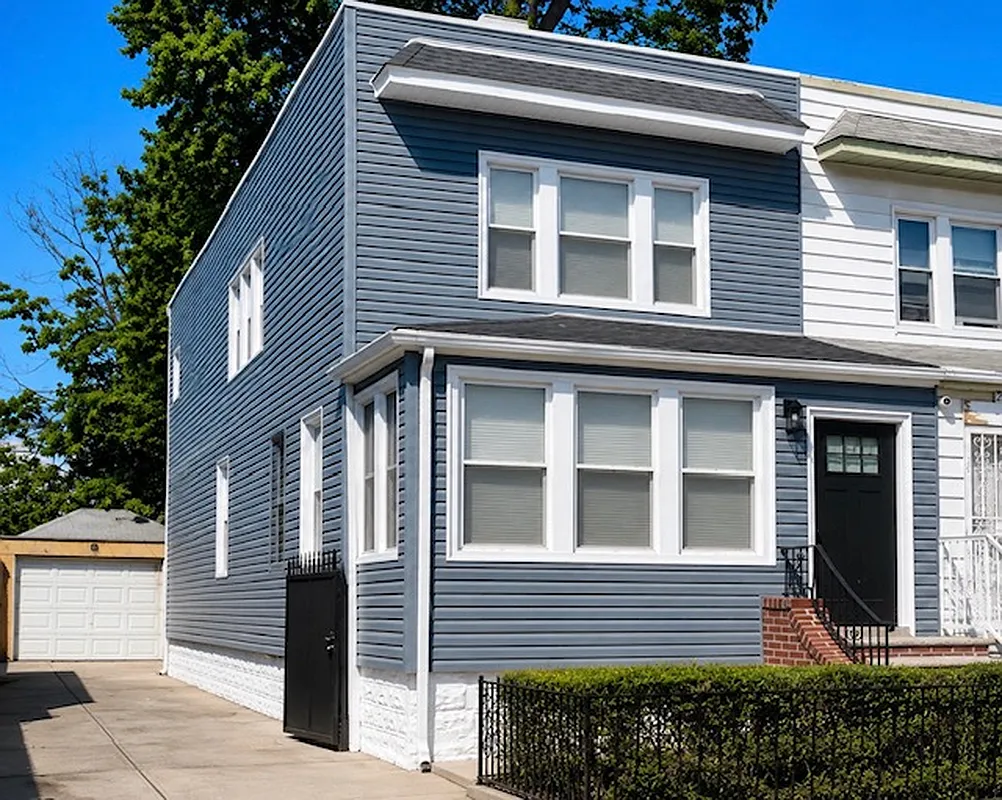 semi-detached house with blue siding