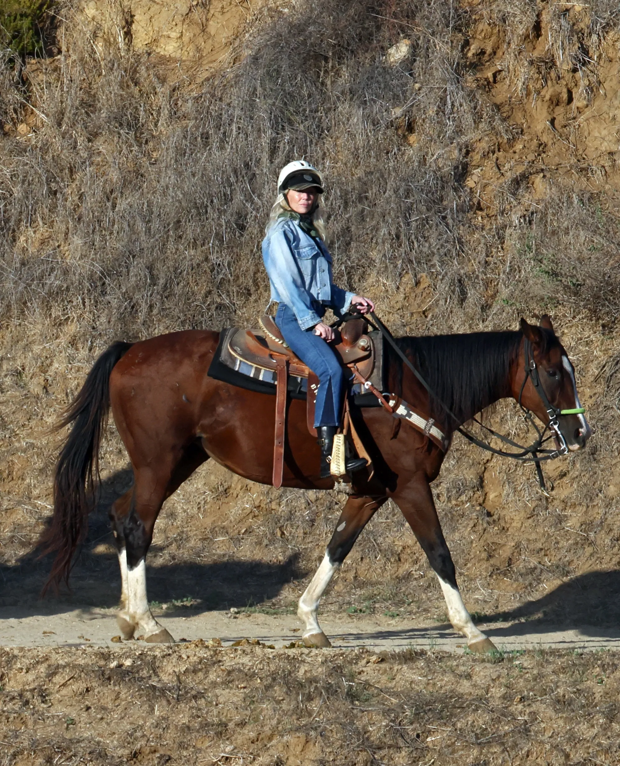 Heather Locklear horseback riding.