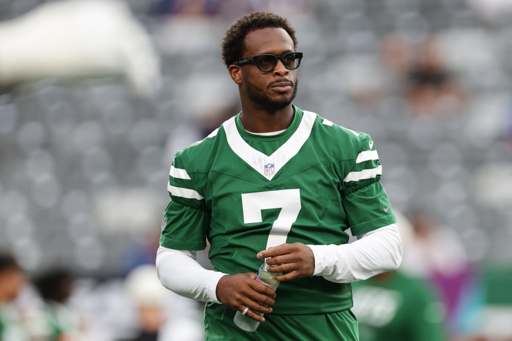 New York Jets quarterback Geno Smith on the field before a preseason NFL football game.
