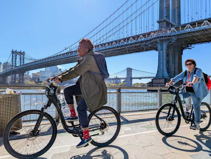 two women on bikes in NYC