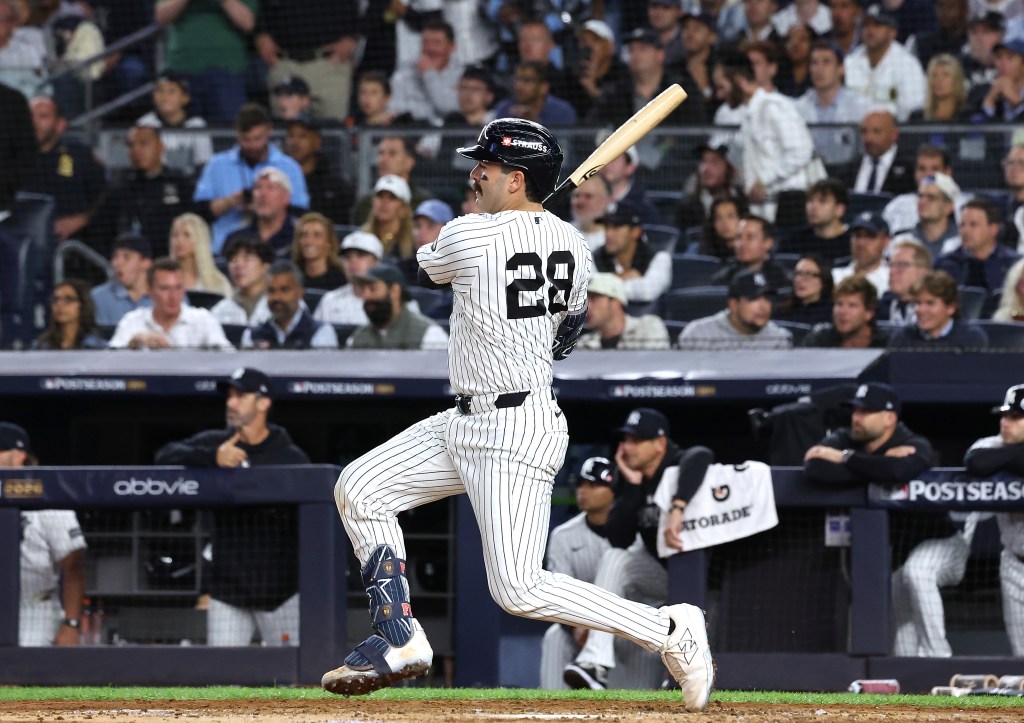 New York Yankees catcher Austin Wells hits an RBI single against the Boston Red Sox at Yankee Stadium.