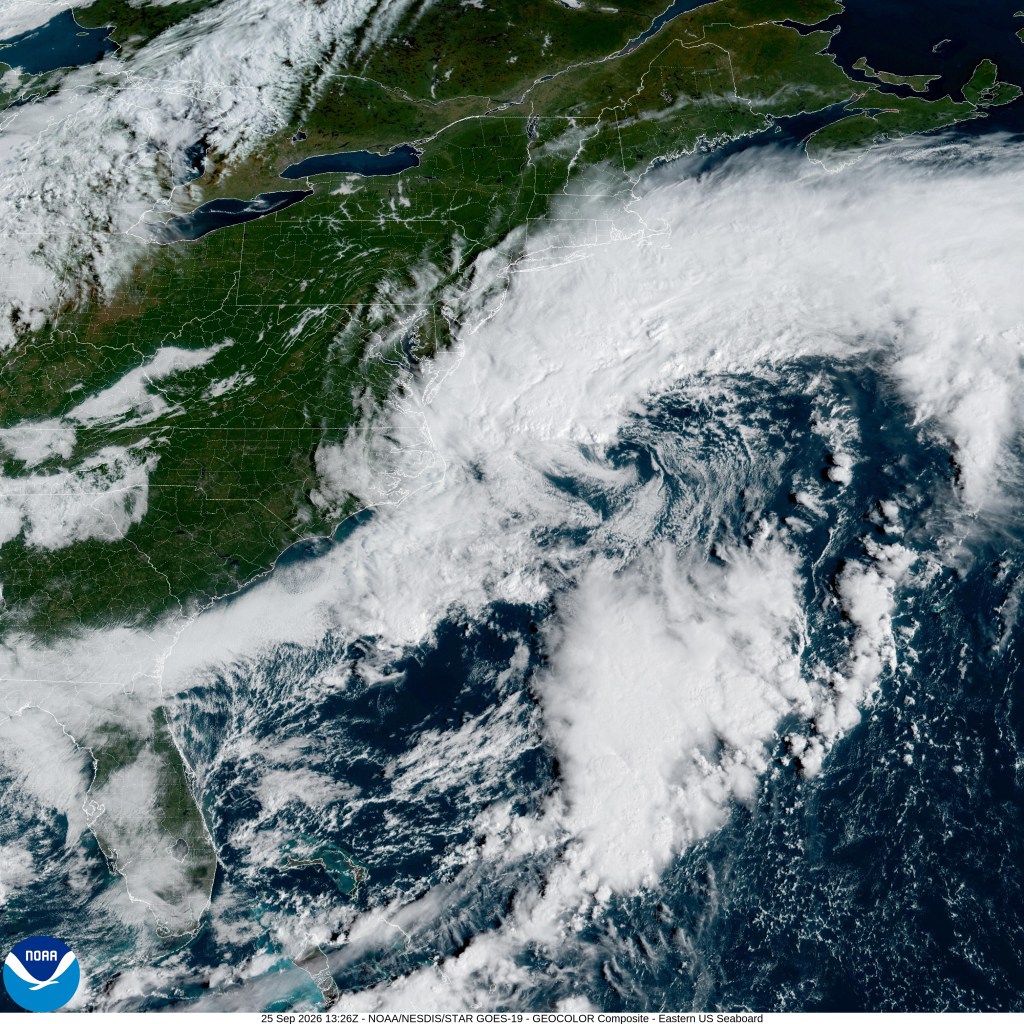 Satellite image showing a storm system over the Atlantic Ocean along the East Coast of the United States and Canada.