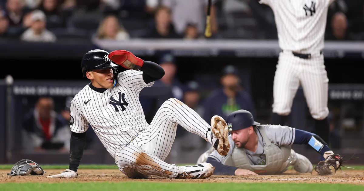 Lombard's incredible slide, tiebreaking homer lift Yanks over Rays