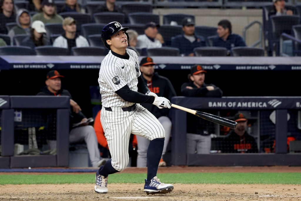 New York Yankees shortstop Anthony Volpe watches his hit during a game against the Baltimore Orioles at Yankee Stadium.
